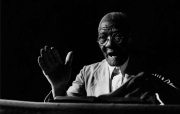 Sunday-Faces-Preacher-at-Podium-scaled